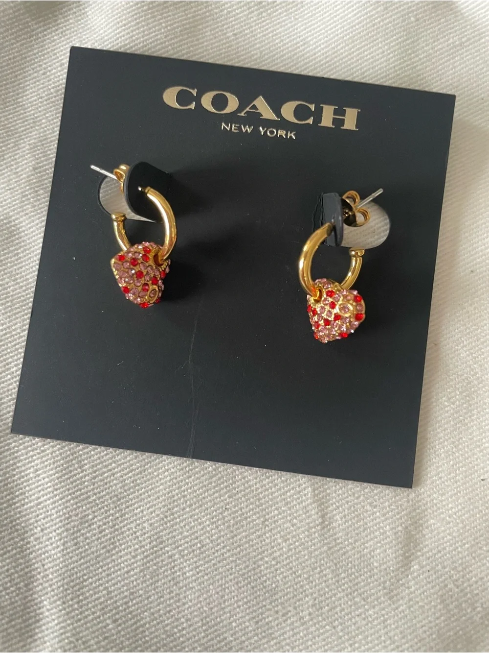 COACH Gold Hoop Earrings with Red Crystal Heart Charms
